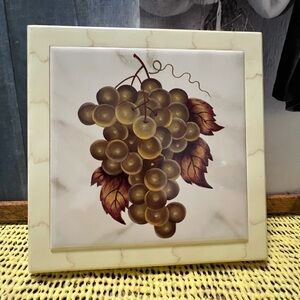 Ceramic trivet hot plate table protector.